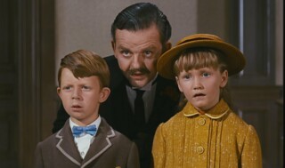 Mr Banks encourages his children to heed Mr Dawes Sr’s investment advice. Photo © Landmark Media/Alamy