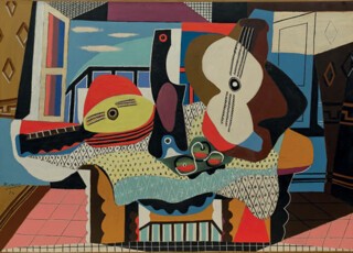 ‘Guitar and Mandolin on a Table’ (1924).