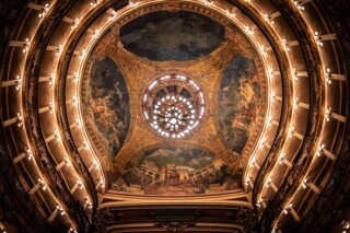 The interior of the cupola of the Teatro Amazonas in Manaus, Brazil. Photo © Rafael Zart