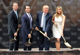 Eric, Donald Jr, Donald and Ivanka at the groundbreaking ceremony for the Trump International Hotel in Washington DC in 2014 (the hotel is due to open in September)