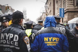 NYPD officers policing a protest outside Columbia University on 24 March. Photo © Kena Betancur / VIEWpress