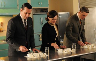 Peggy with her colleagues in season seven.