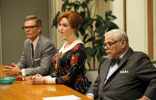 Joan with her colleagues in season six.
