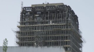 Forensics workers at the tower.