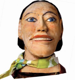 Painted sculpture of a woman’s face by S.L. Jones